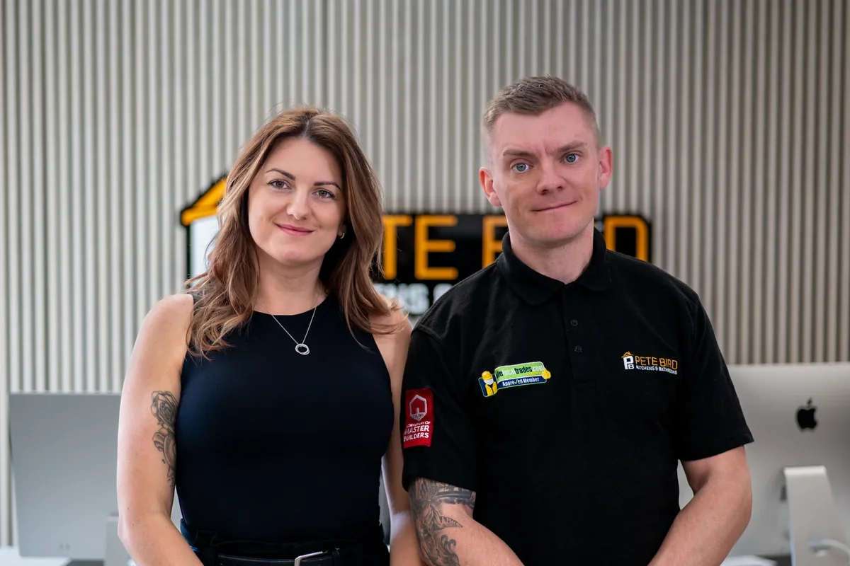The two Pete Bird Kitchens and Bathrooms owners together in their showroom